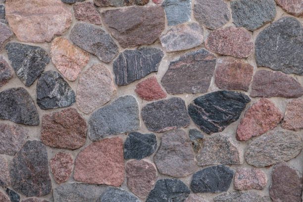 istock Wall of chipped stone. Close-up. 1178725641