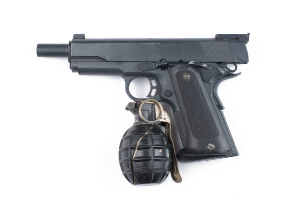 istock Gun and bomb isolated on white background.Pistol isolated. 1178726540