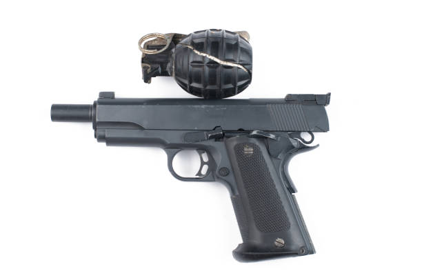 istock Gun and bomb isolated on white background.Pistol isolated. 1178726578