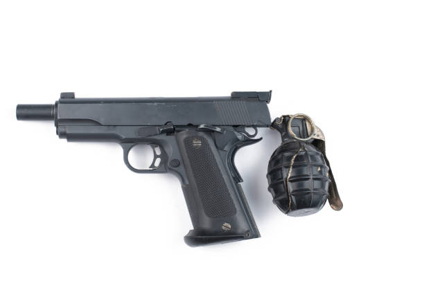 istock Gun and bomb isolated on white background.Pistol isolated. 1178726580
