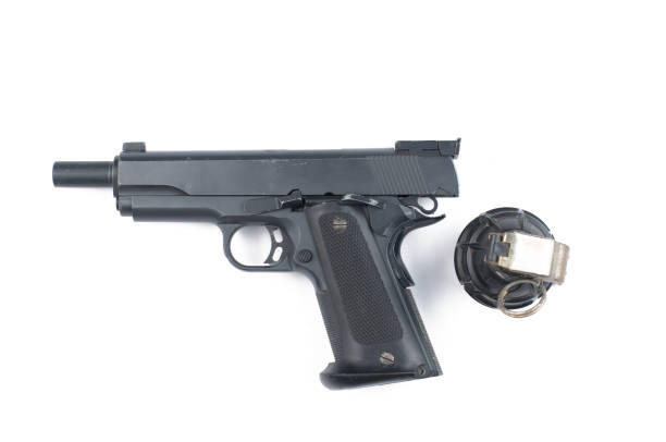 istock Gun and bomb isolated on white background.Pistol isolated. 1178726600