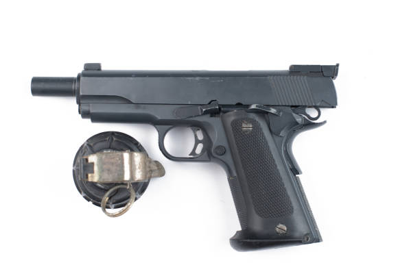 istock Gun and bomb isolated on white background.Pistol isolated. 1178726603
