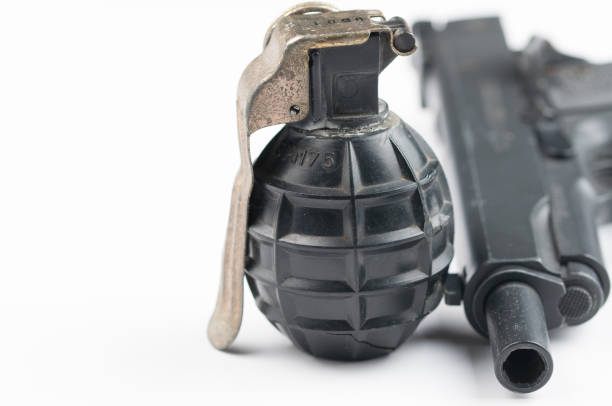 istock Gun and bomb isolated on white background.Pistol isolated. 1178726619