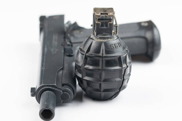 istock Gun and bomb isolated on white background.Pistol isolated. 1178726623