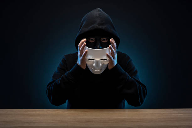 Masked man in hoodie