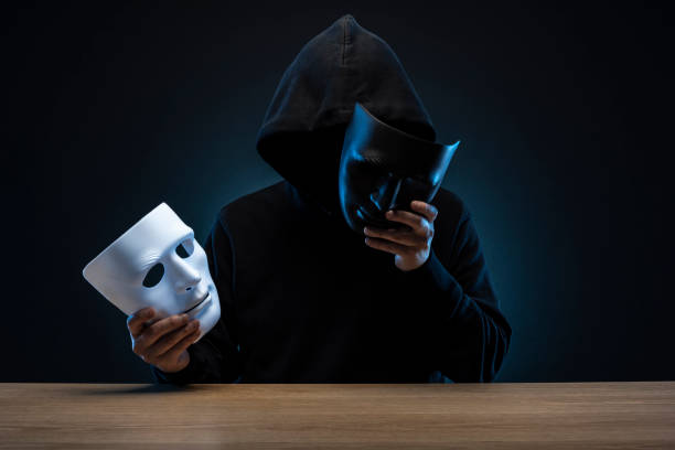 istock Masked man in hoodie 1178726773