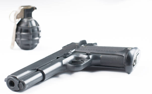 istock Gun and bomb isolated on white background.Pistol isolated. 1178727781