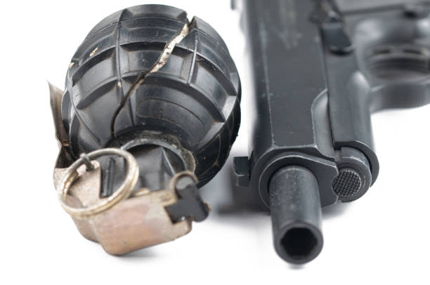 istock Gun and bomb isolated on white background.Pistol isolated. 1178728042