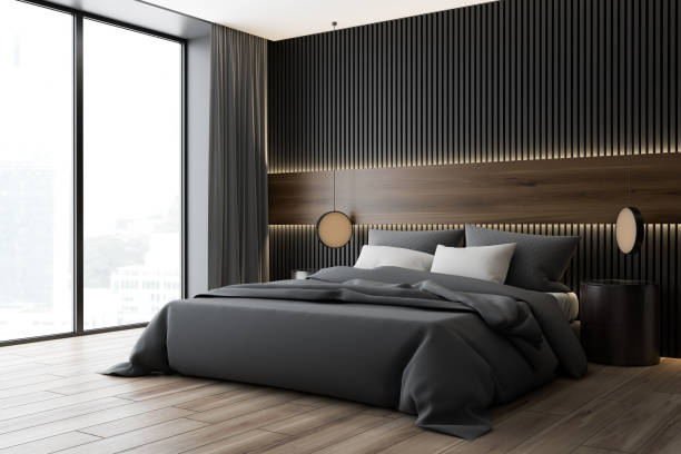 istock Dark wood and gray bedroom corner 1178728134