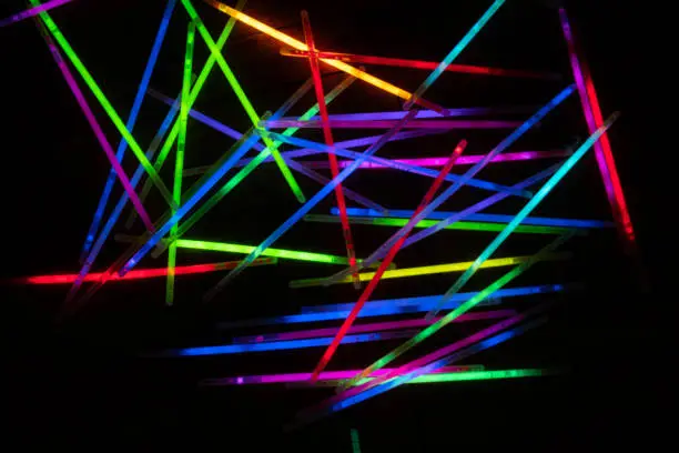 Photo of many glow stick shinny with dark background