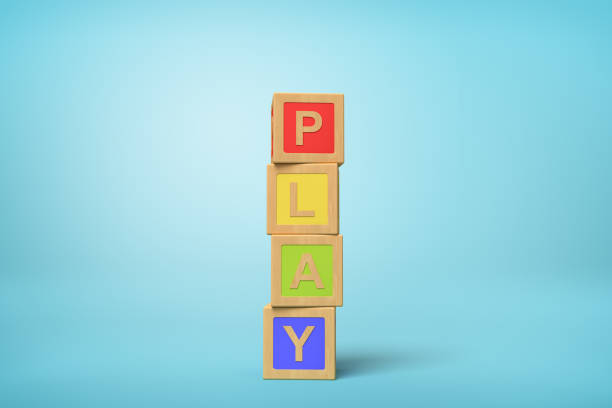 istock 3d rendering of alphabet toy blocks on blue background. 1178729834