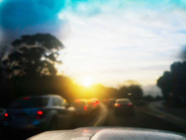 istock Traffic at sunset after rain, seen through windshield 1178732600