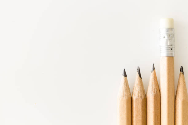 istock Bunch of pencils one with eraser up standing out, on white background with copy-space. 1178734657