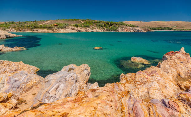 Fanaraki beach and Seal's cave on Lemnos island, Greece stock photo