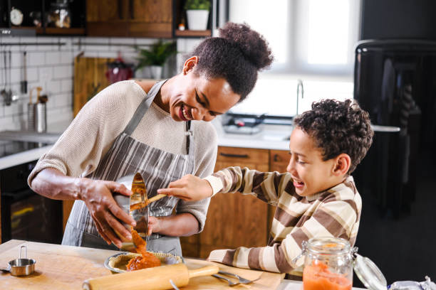 istock Mother and son baking together 1178735067