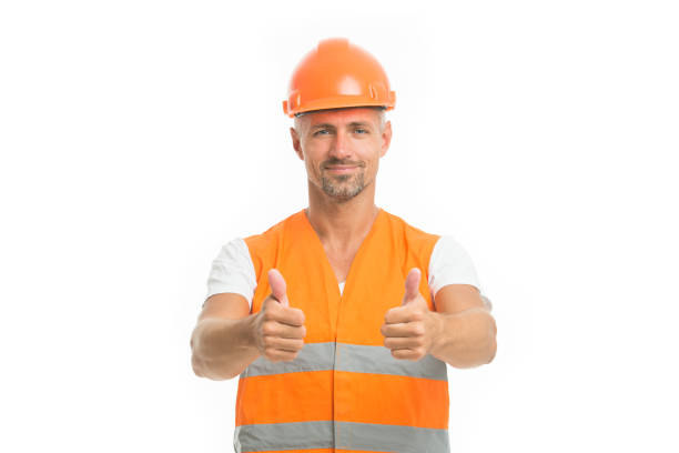 istock Good job. Safety is main point. Man builder wear protective hard hat and uniform white background. Worker builder confident looking camera. Protective equipment concept. Strong handsome builder 1178736266
