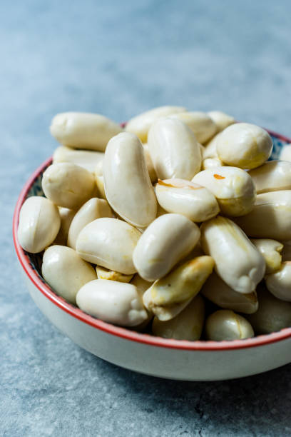 istock Organic Raw Unsalted White Peanuts in Bowl. 1178736767