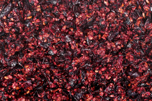 istock Pressed grape pomace, seeds and skins. Winemaking background. 1178739796