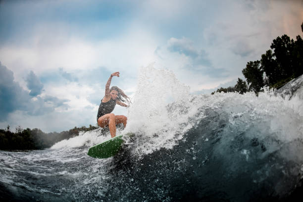 istock Girl wakesurfer gliding smoothly on a board 1178739964