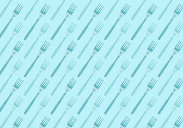 istock Many black plastic forks on blue background, top view 1178740327