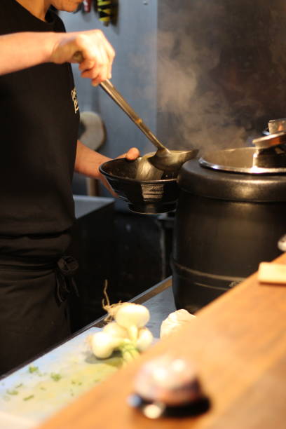 istock Man preparing japanese ramen noodle soup 1178741697