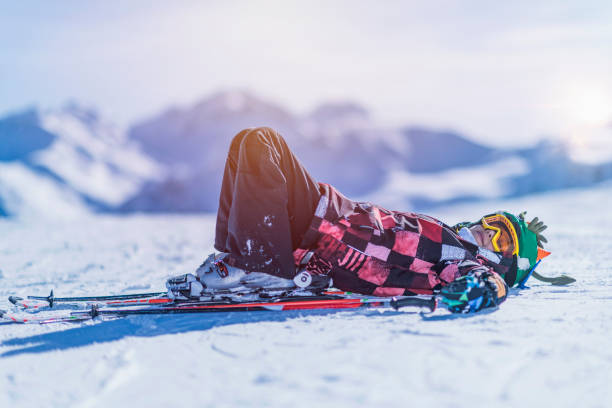 istock Little Boy Resting on a Mountain Top Ski Resort 1178742753