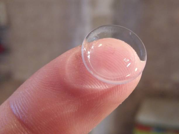 istock eye contact lense on finger. Macro photo. 1178743991