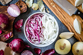 Cutting red and golden onions
