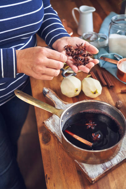istock Preparing Poached Pears in Red Wine with Dark Chocolate 1178753819