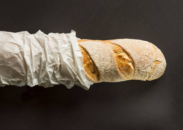 Italian Grissini on a concrete background. Grissini is a particular kind of bread made in the note of Italy.
