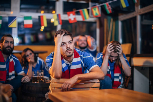 istock Disappointed sport fans at the pub 1178758382