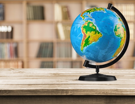 Globe on a table with blurred background