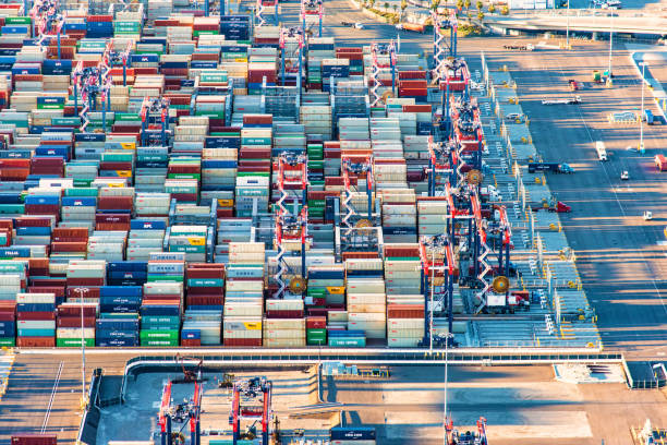 Long Beach, United States - March 28, 2018:  Outdoor storage area for numerous cargo containers delivered to the United States through the Ports of Long Beach and Los Angeles, California; the busiest seaport on the west coast of the United States, from an altitude of about 1500 feet during a helicopter photo flight.