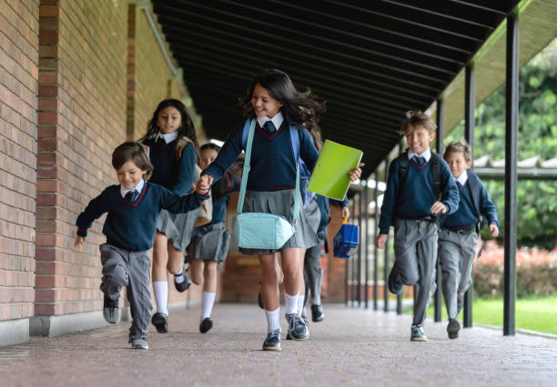 istock Latin American students running to their class 1178762754