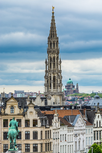 Cityscape of brussels with the landmark of town hall tower against cloudy sky from the Monts des arts, brussels, Belgium.