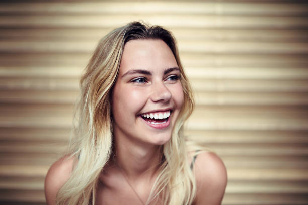 Cropped shot of an attractive young woman posing outside
