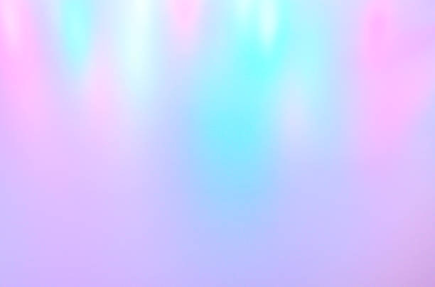 istock Blurred multicolored background from light. Iridescent holographic abstract soft pastel colors backdrop. 1178764599