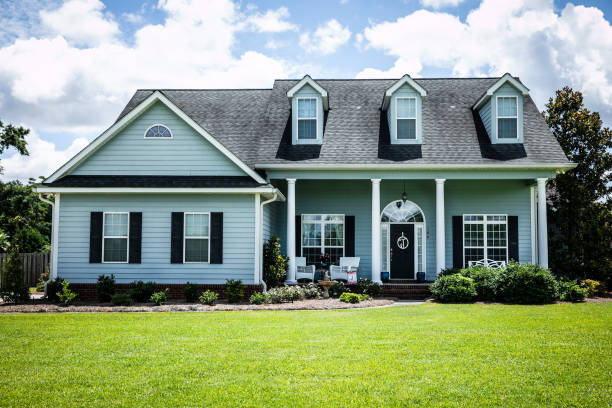 istock Front View of blue house with siding in the suburbs 1178764762