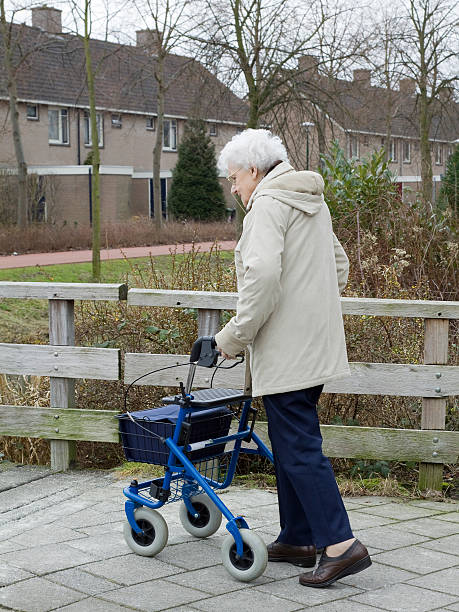 istock senior woman with walker 117876514