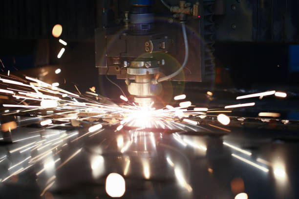 istock Laser metall cut cnc machine. Fly fire sparks background. 1178770885
