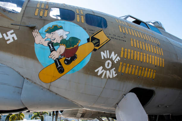 B-17 909 Collings Foundation nose art Noser art of B-17 G WW II Bomber operated by the Collings Foundation. This aircraft is part of a collection of restored planes that tours the country and offers rides to paying customers. The aircraft is  a replica of the B-17 909 originally flown by the 323rd Bomb Squadron, 91st Bomb Group, that completed 140 combat missions during World War II, believed to be the Eighth Air Force record for most missions, without loss to the crews that flew it.
This aircraft was destroyed in a crash at Bradley Field, Windsor Locks Connecticut, on October 2, 2019 with multiple fatalities and casualties. 
Vero Beach, Florida.
January 312, 2018 robertmichaud stock pictures, royalty-free photos & images
