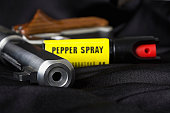 Handgun and Pepper Spray
