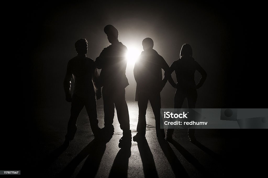 Gang in the shadows  Gang Stock Photo