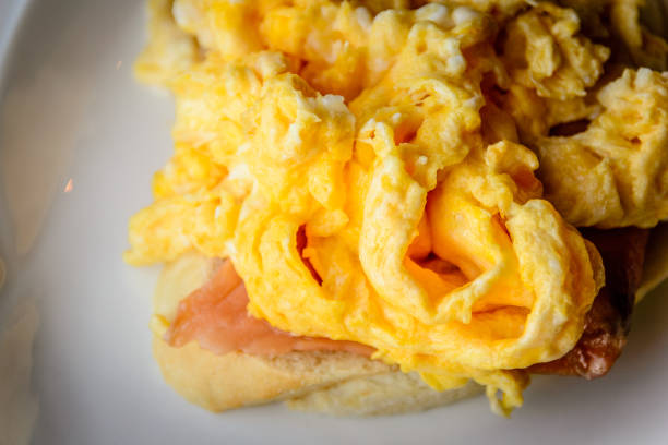istock scrambled eggs on smoked salmon and baguette served on a white china plate 1178778072