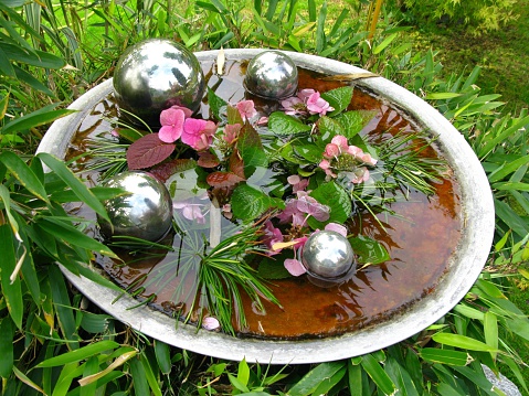 A place to wash hands in a Japanese garden called Tsukubai