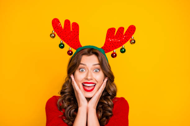 istock Pretty lady overjoyed with xmas decor wear head horns and knitted pullover isolated yellow background 1178779843