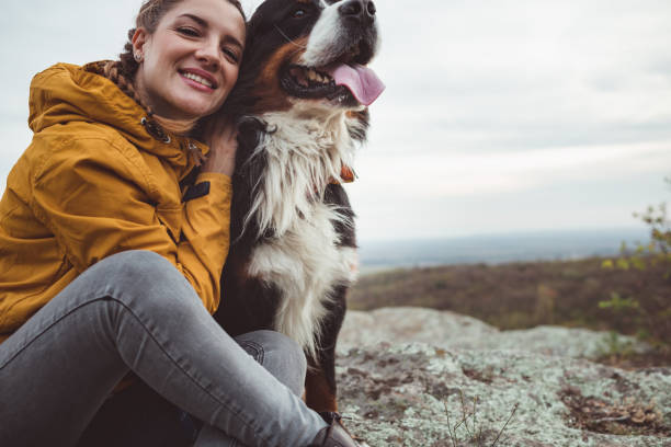 istock Young woman with dog 1178780021