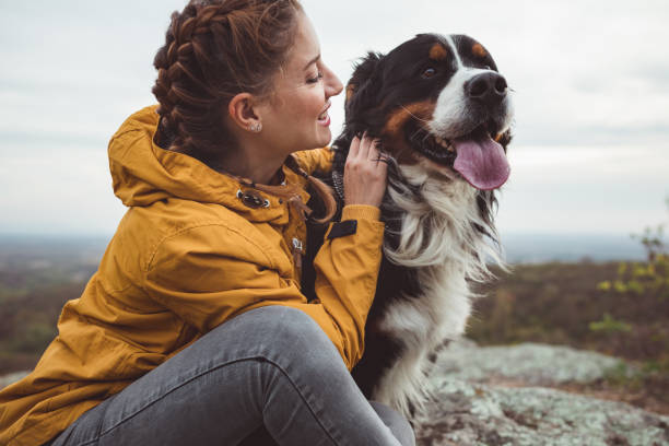 istock Young woman with dog 1178780095