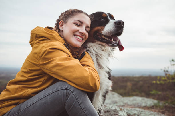istock Young woman with dog 1178780146