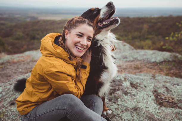 istock Young woman with dog 1178780276